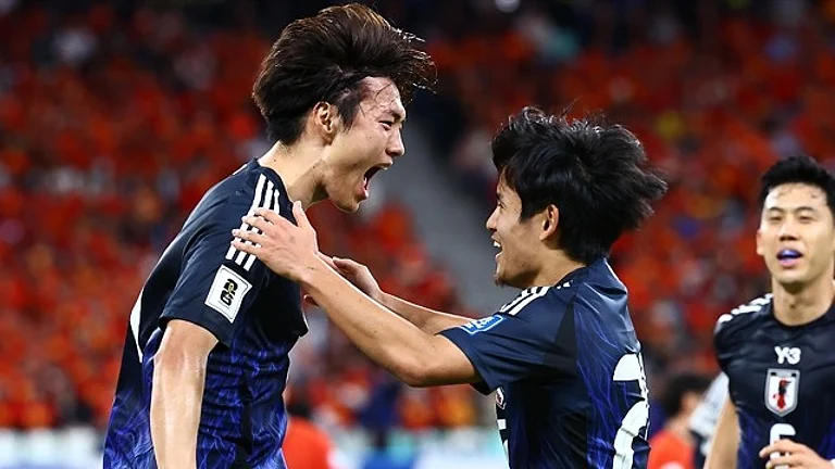 Japan football team players celebrating after a goal. - Photo: X | Japan Football Association