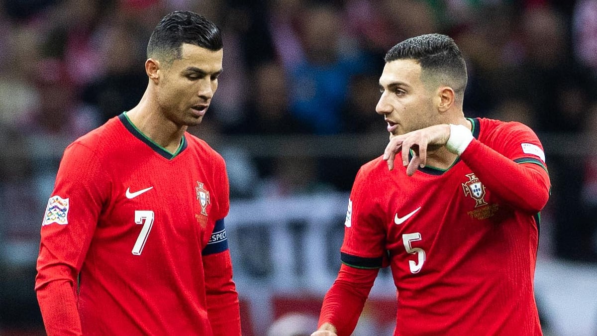Dalot (right) hopes to win more international honours alongside Ronaldo