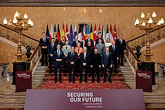 Photo: Getty Images : Trying to Stand: United British Prime Minister Keir Starmer (front row, centre) with leaders at the 
European Leaders Summit in London on March 2, 2025