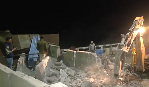 Police used bulldozers to remove concrete barricades erected at Haryana - Punjab Shambhu Borde