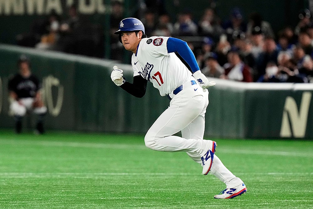 | Photo: AP/Eugene Hoshiko : Major League Baseball: Los Angeles Dodgers vs Chicago Cubs