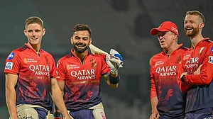 X/RCBTweets : Virat Kohli and Jacob Bethell with RCB support staff.