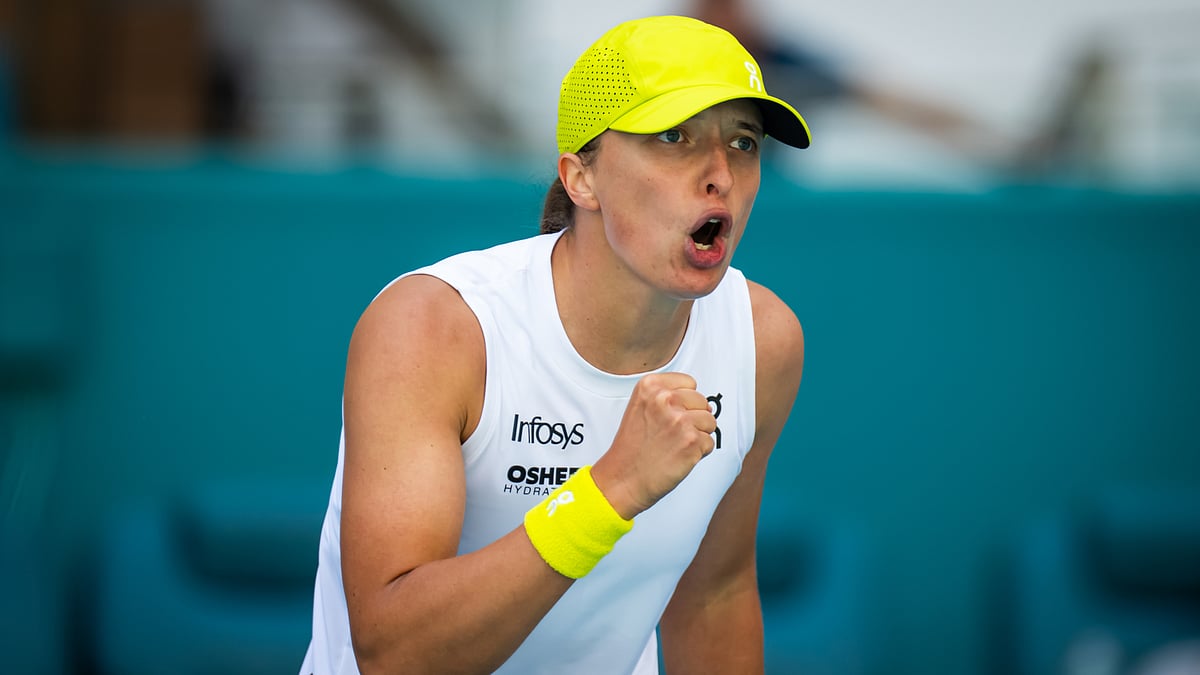 Iga Swiatek celebrates after seeing off Caroline Garcia.