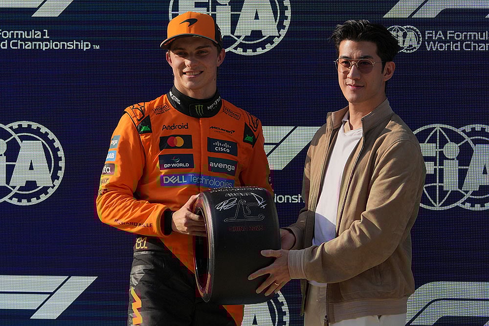 | Photo: AP/Andy Wong : China F1 GP Auto Racing