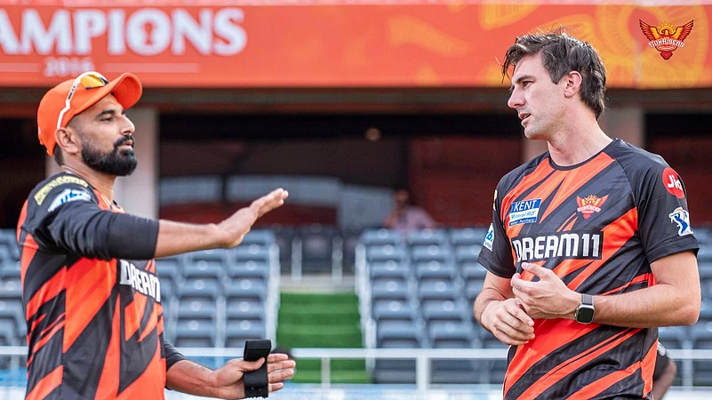 Pat Cummins with Mohammed Shami
