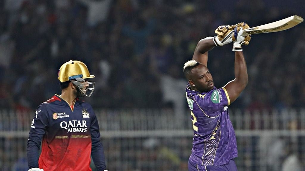 Photo: X | Royal Challengers Bengaluru : KKR's Andre Russell with RCB wicketkeeper Jitesh Sharma after losing his wicket in the IPL 2025 opener.