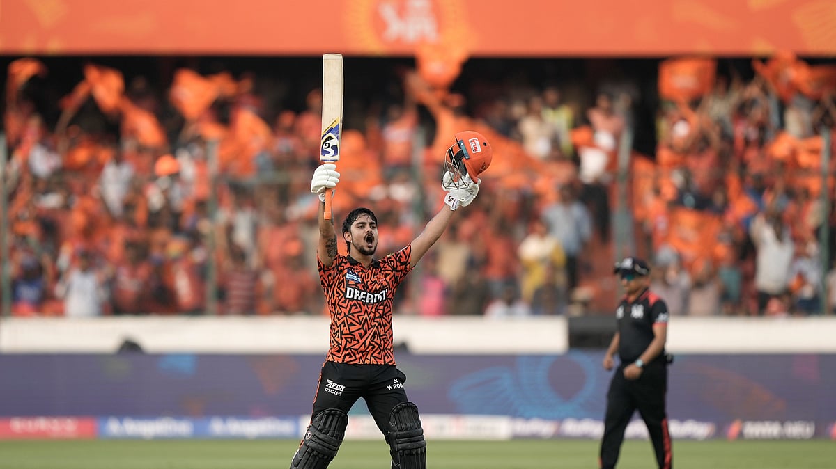 AP Photo/Mahesh Kumar A. : Sunrisers Hyderabad's Ishan Kishan celebrates after scoring a century during the Indian Premier League cricket match between Sunrisers Hyderabad and Rajasthan Royals in Hyderabad.