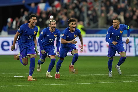 France players celebrate after winning the penalty shootout during the UEFA Nations League quarterfinal second leg soccer match between France and Croatia, at the Stade de France in Saint-Denis, outside Paris, Sunday, March 23, 2025.