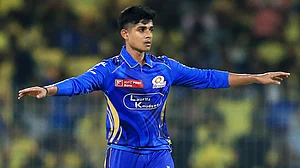 AP : Mumbai Indians' Vignesh Puthur celebrates the dismissal of Chennai Super Kings' Shivam Dube during the Indian Premier League match.