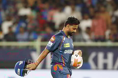 Lucknow Super Giants' captain Rishabh Pant walks off the field after losing his wicket during the Indian Premier League cricket match between Delhi Capitals and Lucknow Super Giants at ACA–VDCA Cricket Stadium in Visakhapatnam, India, Monday, March 24, 2025.