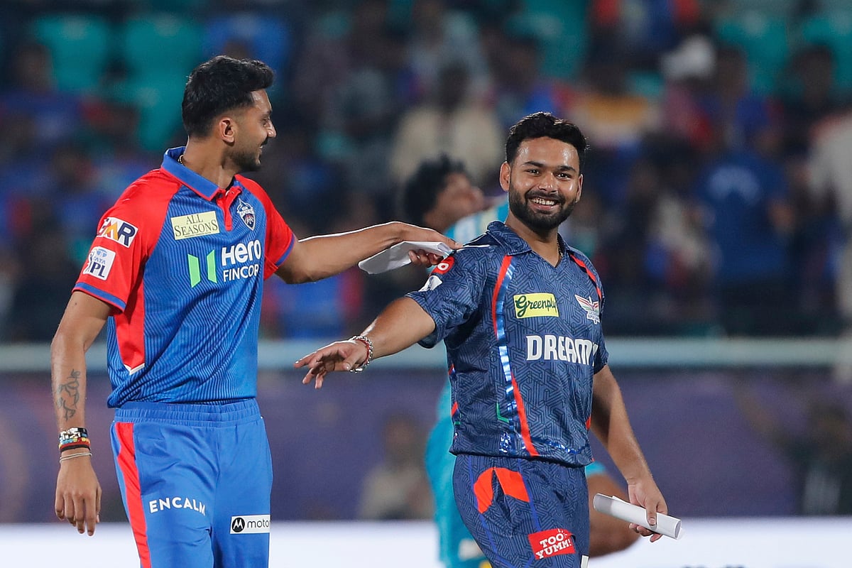(AP Photo/Surjeet Yadav) : Lucknow Super Giants' captain Rishabh Pant and Delhi Capitals' captain Axar Patel talk after the toss during the Indian Premier League cricket match between Delhi Capitals and Lucknow Super Giants at ACA–VDCA Cricket Stadium in Visakhapatnam, India, Monday, March 24, 2025. 