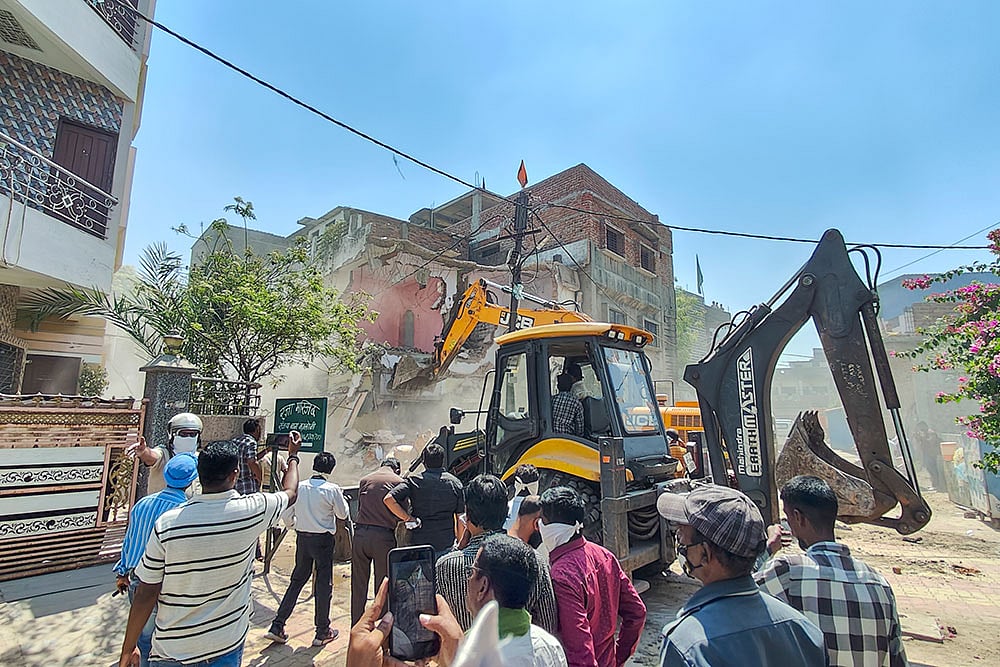 | Photo: PTI : Nagpur riots: Fahim Khan's house demolished