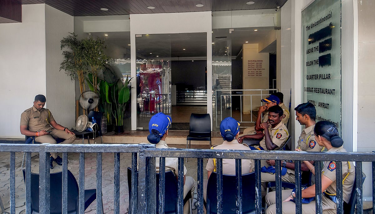 -PTI : Police personnel outside the hotel where Shiv Sena (Shinde) workers allegedly vandalised the Habitat Studio over stand-up comedian Kunal Kamra's alleged defamatory remarks against Maharashtra Deputy Chief Minister Eknath Shinde, in Mumbai, Monday, March 24, 2025.
