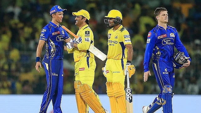 AP : Mumbai Indians' Trent Boult, left, and Chennai Super Kings' Mahendra Singh Dhoni have a chat after their Indian Premier League match in Chennai.