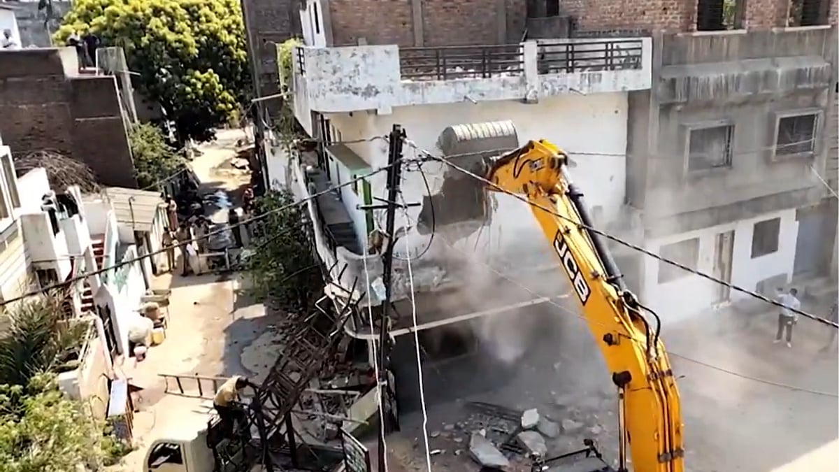 | Photo: Screengrab from PTI :  Illegal Portion Of Key Accused's House Demolished 