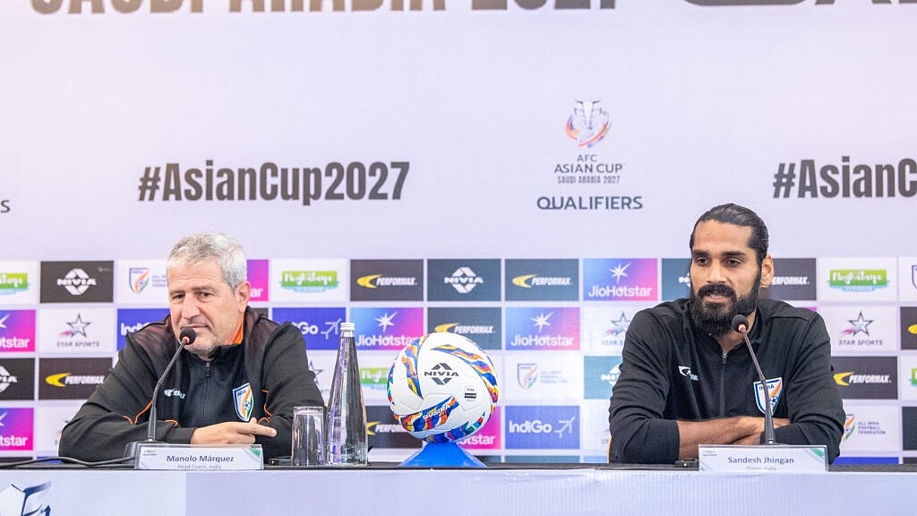 India head coach Manolo Marquez (left) with defender Sandesh Jhingan. - AIFF