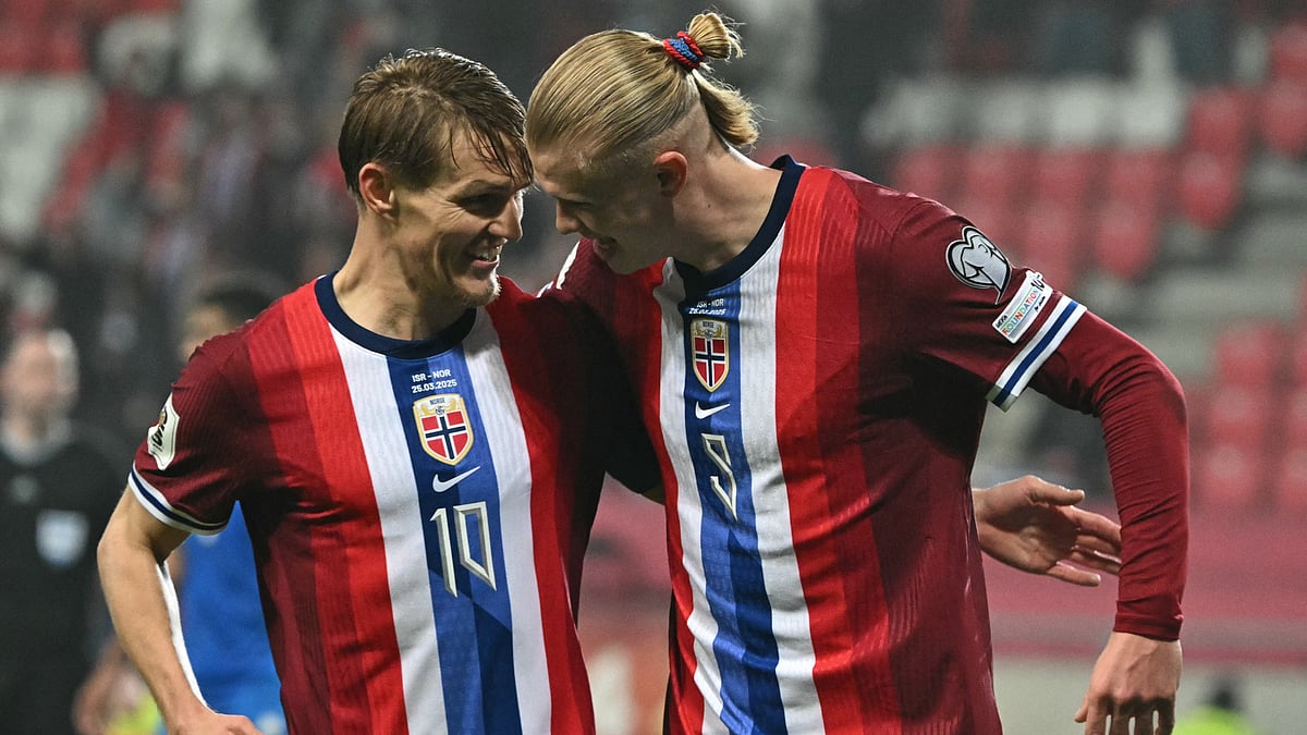 Martin Odegaard and Erling Haaland celebrate the latter's goal versus Israel
