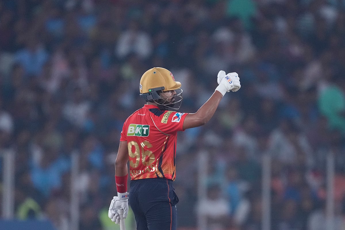 (AP Photo/Ajit Solanki)

 : Punjab Kings' captain Shreyas Iyer celebrates after scoring fifty runs during the Indian Premier League cricket match between Gujarat Titans and Punjab Kings at Narendra Modi Stadium in Ahmedabad, India, Tuesday, March 25, 2025. 
