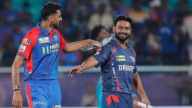 AP : Lucknow Super Giants' captain Rishabh Pant with Delhi Capitals' skipper Axar Patel.