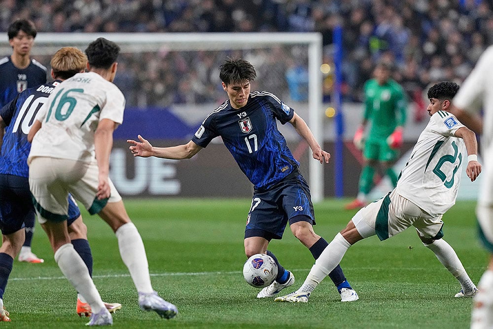 | Photo: AP/Eugene Hoshiko : FIFA World Cup 2026 Qualifiers: Japan vs Saudi Arabia