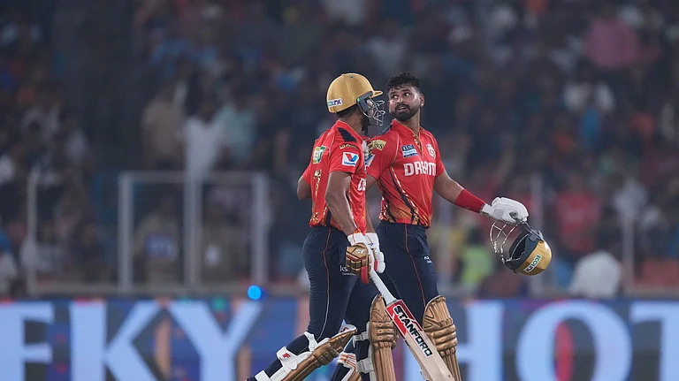 Punjab Kings' captain Shreyas Iyer and Shashank Singh walk back to pavilion after their innings during the Indian Premier League cricket match between Gujarat Titans and Punjab Kings at Narendra Modi Stadium in Ahmedabad. - AP Photo/Ajit Solanki
