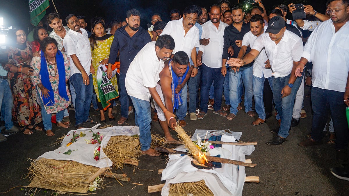 | PTI : Congress workers stage a protest against the suspension of 12 Congress MLAs from the Odisha Assembly for seven days, in Bhubaneswar, Tuesday, March 25, 2025.