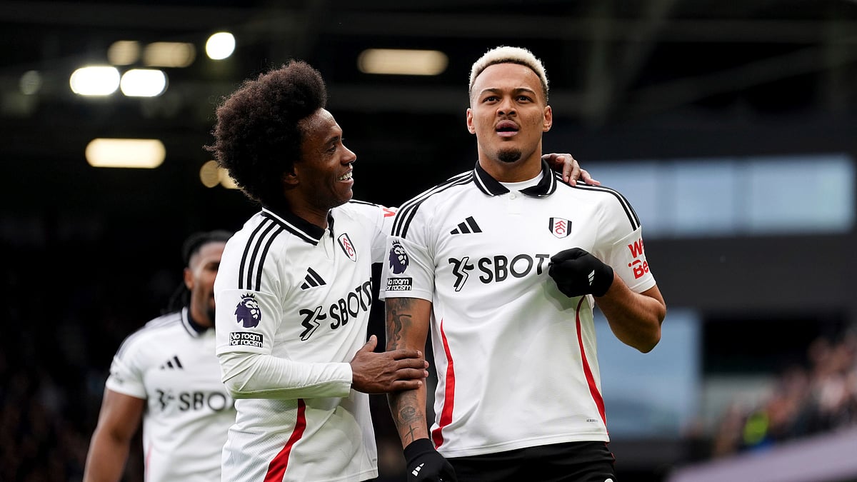 (Zac Goodwin/PA via AP)

 : Fulham's Rodrigo Muniz, right, celebrates with Willian after scoring his sides first goal during the English Premier League soccer match between FC Fulham and Tottenham Hotspur, in London, Sunday, March 16, 2025. 
