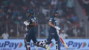 AP Photo/Ajit Solanki : Gujarat Titans' captain Shubman Gill and batting partner Sai Sudharsan run between the wickets to score during the Indian Premier League cricket match between Gujarat Titans and Punjab Kings at Narendra Modi Stadium in Ahmedabad.