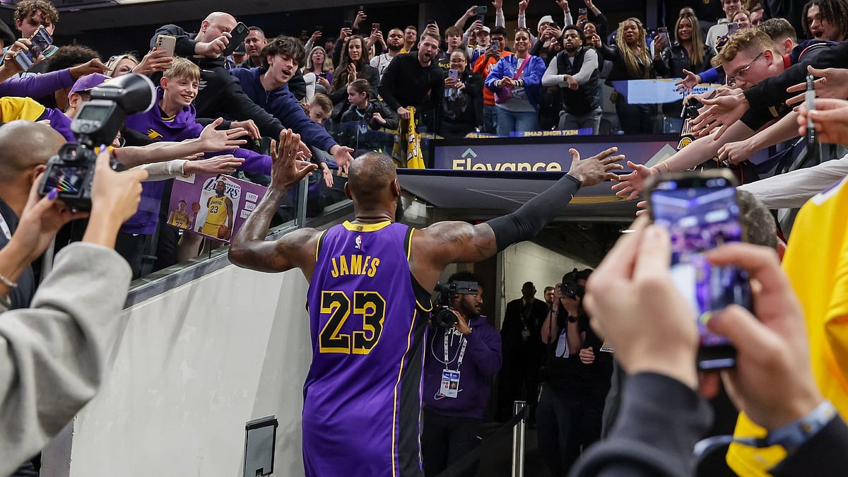 LeBron James #23 of the Los Angeles Lakers acknowledges fans following the game against the Indiana Pacers at Gainbridge Fieldhouse on March 26, 2025 in Indianapolis, Indiana.