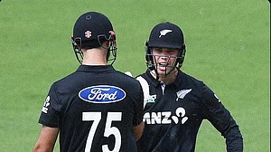 X/BlackCaps : Mark Chapman with Daryl Mitchell.
