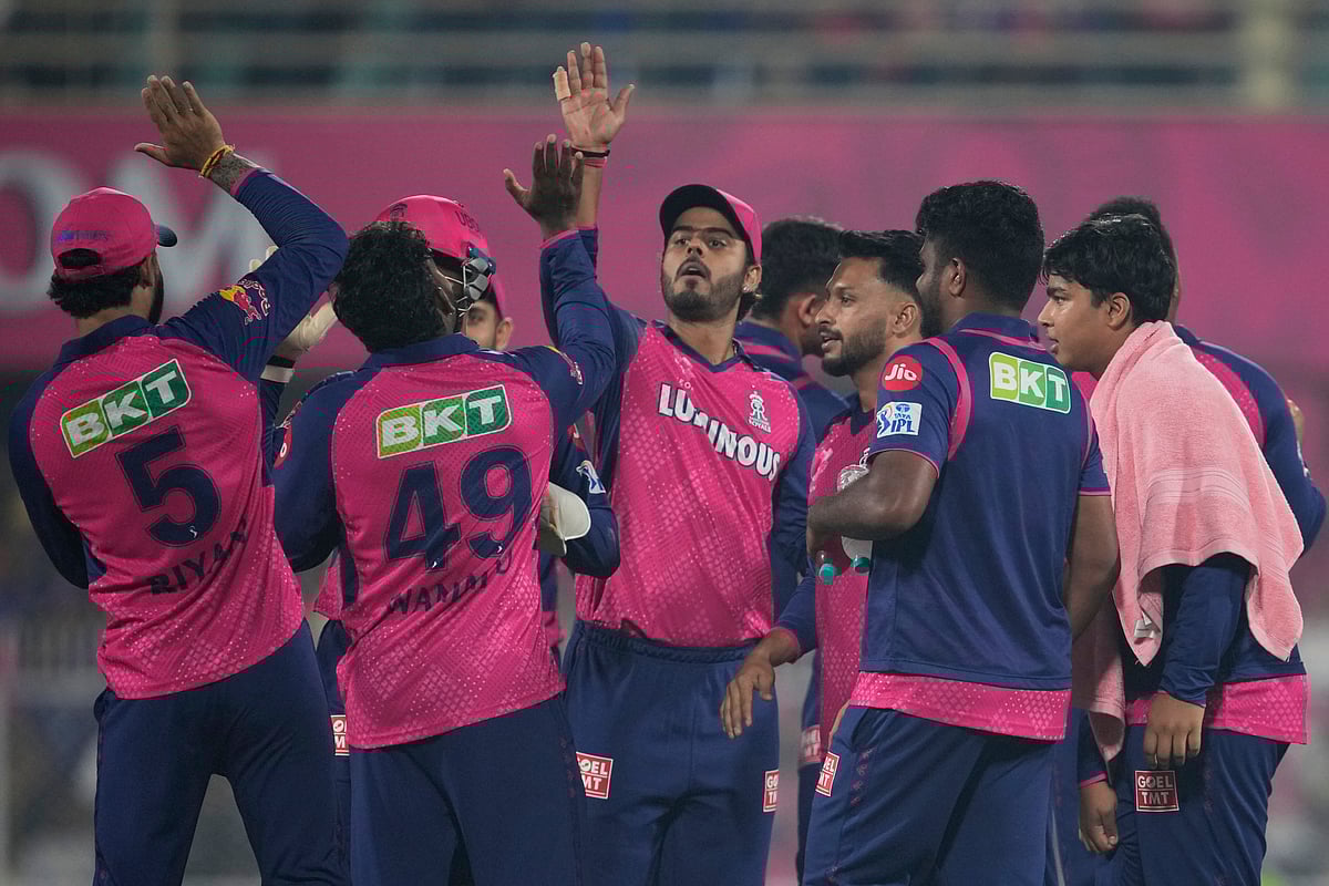 Rajasthan Royals players celebrates the dismissal of Kolkata Knight Riders' captain Ajinkya Rahane during the Indian Premier League cricket match between Rajasthan Royals and Kolkata Knight Riders at Assam Cricket Association Stadium in Guwahati, India, Wednesday, March 26, 2025. -  (AP Photo/Anupam Nath)