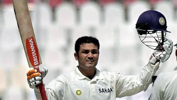 X/ICC : Virender Sehwag celebrating during his iconic 309 in Multan.