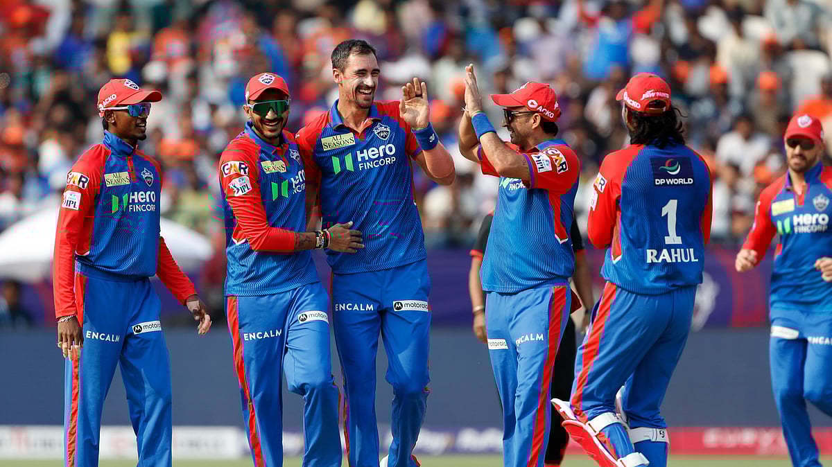 AP Photo/Surjeet Yadav : Delhi Capitals' Mitchell Starc, center, celebrates the wicket of Sunrisers Hyderabad's Ishan Kishan during the Indian Premier League cricket match between Delhi Capitals and Sunrisers Hyderabad at ACA–VDCA Cricket Stadium in Visakhapatnam.