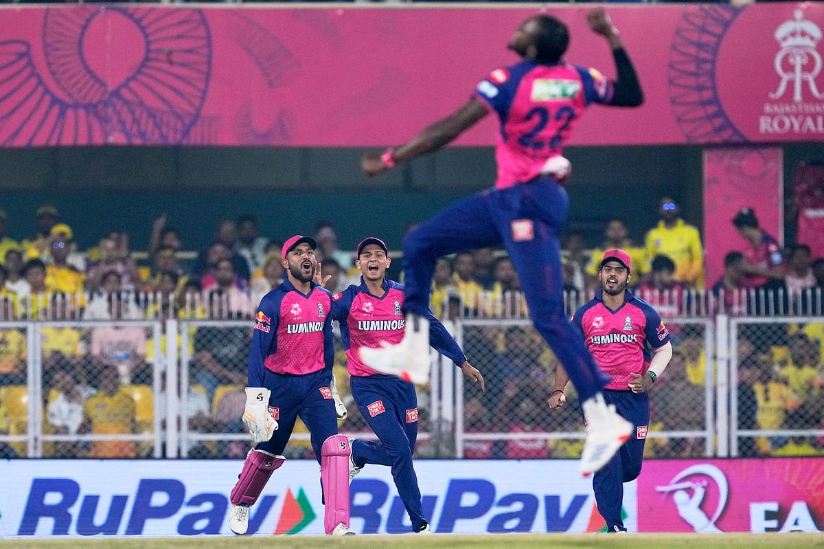 (AP Photo/Anupam Nath)
 : Rajasthan Royals' Jofra Archer jumps up in celebration after taking the wicket of Chennai Super Kings' Rachin Ravindra during the Indian Premier League cricket match between Chennai Super Kings and Rajasthan Royals at Barsapara Cricket Stadium in Guwahati, India, Sunday, March 30, 2025. 



