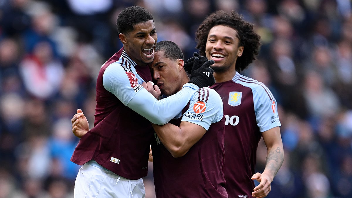 Marcus Rashford celebrates after scoring his second Aston Villa goal