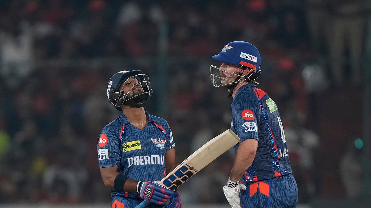 Lucknow Super Giants' Nicholas Pooran, left, celebrates after scoring fifty runs during the Indian Premier League cricket match between Sunrisers Hyderabad and Lucknow Super Giants at Rajiv Gandhi International Cricket Stadium in Hyderabad, India, Thursday, March 27, 2025. (AP Photo/Mahesh Kumar A.)


 -  (AP Photo/Mahesh Kumar A.)
