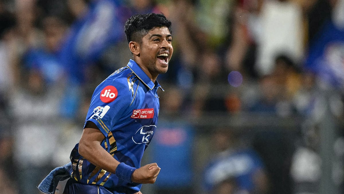 Ashwani Kumar celebrates for Mumbai Indians. - null