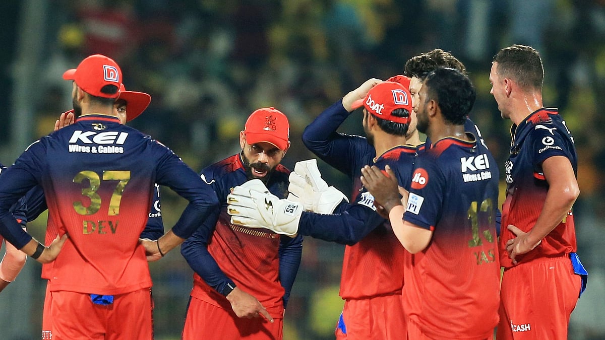 | AP Photo : Royal Challengers Bengaluru's Virat Kohli, center, celebrates with teammates the dismissal of Chennai Super Kings' Deepak Hooda during their Indian Premier League 2025 match at MA Chidambaram Stadium in Chennai on March 28, 2025.