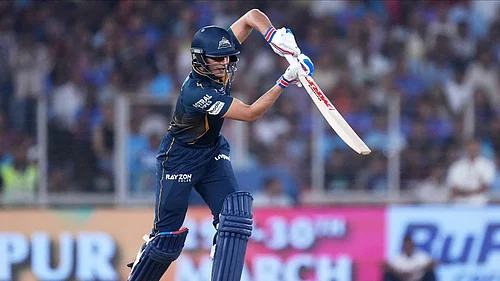 AP Photo/Ajit Solanki : Gujarat Titans' captain Shubman Gill bats during the Indian Premier League cricket match between Gujarat Titans and Mumbai Indians at Narendra Modi Stadium in Ahmedabad.