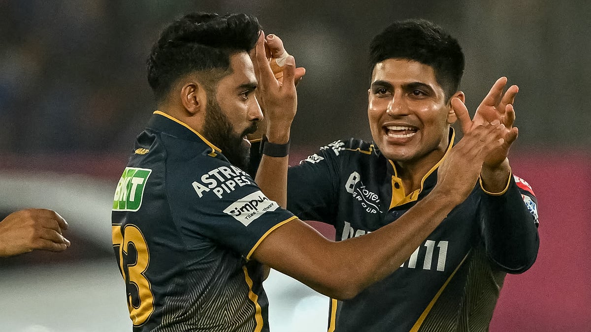 Gujarat Titans' Mohammed Siraj and Shubman Gill