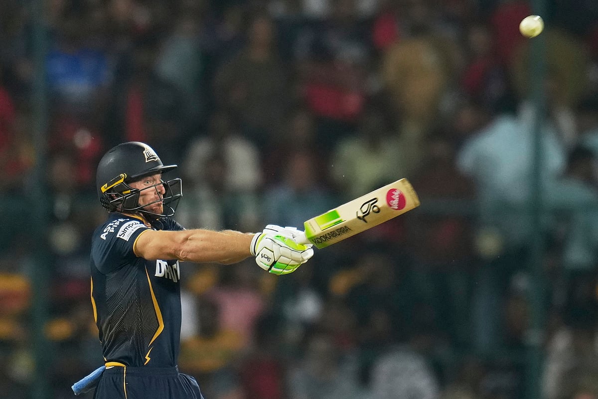 (AP Photo/Aijaz Rahi)

 : Gujarat Titans' Jos Butler bats during the Indian Premier League cricket match between Gujarat Titans and Royal Challengers Bengaluru at Chinnaswamy Stadium in Bengaluru, India, Wednesday, April 2, 2025. 
