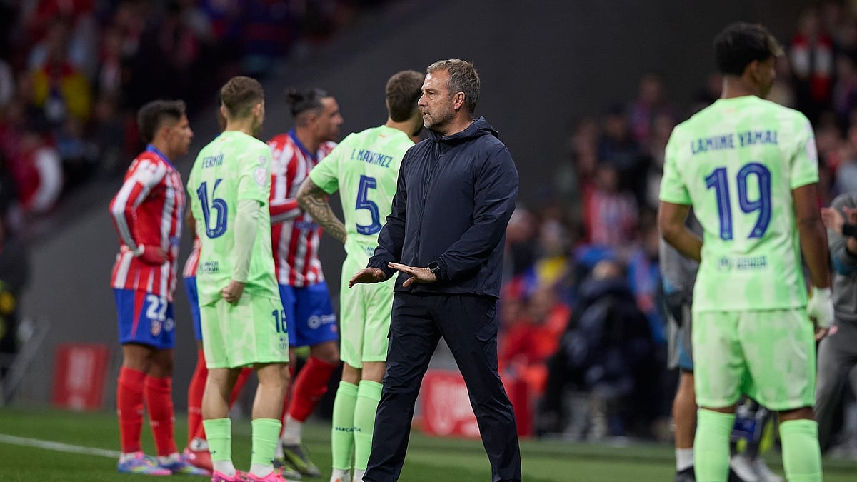 Hansi Flick is playing it cool when it comes to Barca's treble chances - null