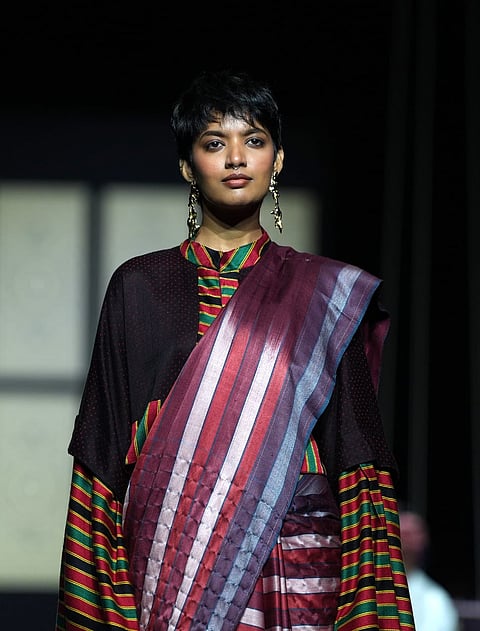 Model present creations by Artisan Designers Of Somaiya Kala Vidya: Zaid Khatri, Amruta Vankar, Mubbasirah Khatri, Muskan Khatri, Shakil Ahmed during the Lakmē Fashion Week in Mumbai.