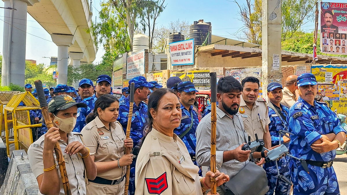 | Image-PTI : RAF and Delhi Police personnel stand guard during the Lok Sabha discussion on the Waqf (Ammendment) Bill, at Jamia Nagar in New Delhi, Wednesday, April 2, 2025.