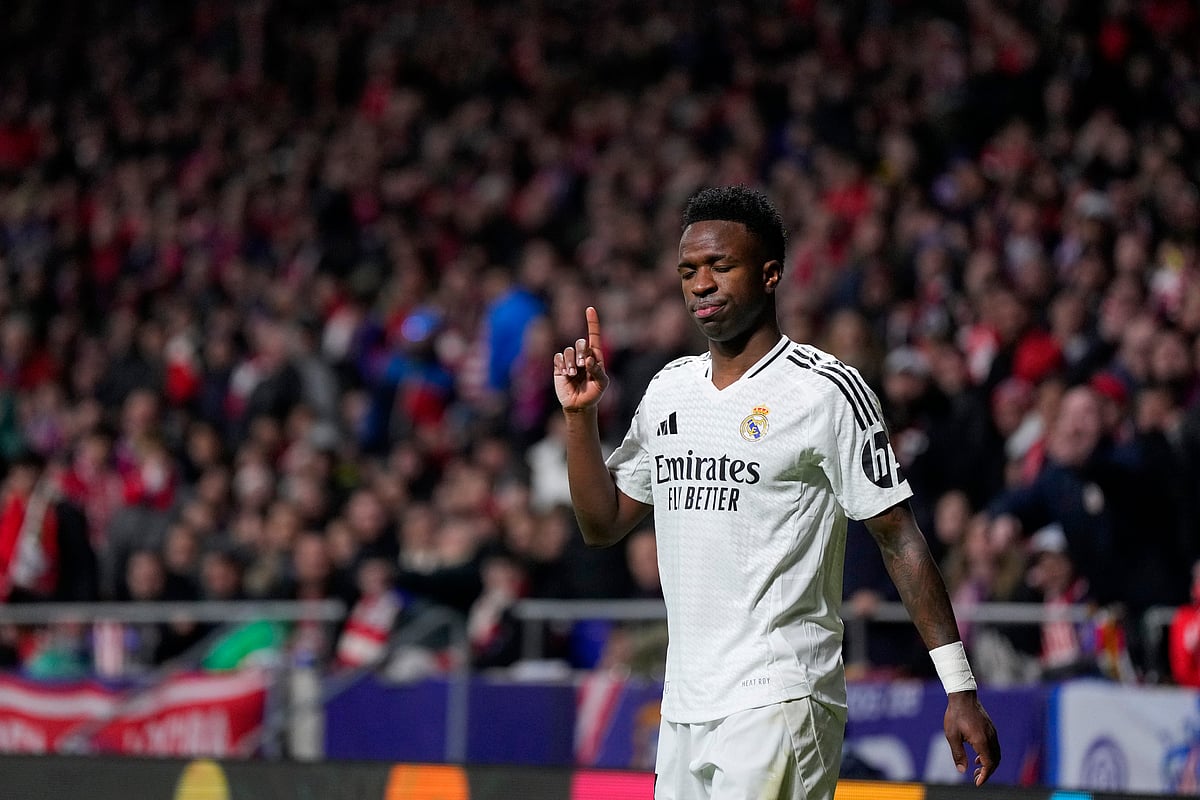 Real Madrid's Vinicius Junior gestures during the Champions League round of 16, second leg, soccer match between Atletico Madrid and Real Madrid at the Metropolitano stadium in Madrid, Spain, Wednesday, March 12, 2025.
 -  (AP Photo/Manu Fernandez)
