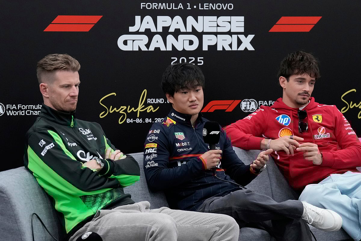 (AP Photo/Hiro Komae) : Red Bull driver Yuki Tsunoda of Japan, center, flanked by Kick Sauber driver Nico Hulkenberg of Germany, left, and Ferrari driver Charles Leclerc of Monaco, responds to a journalist's question during a news conference at the Suzuka Circuit in Suzuka, central Japan, Thursday, April 3, 2025, ahead Sunday's Japanese Formula One Grand Prix race. 

