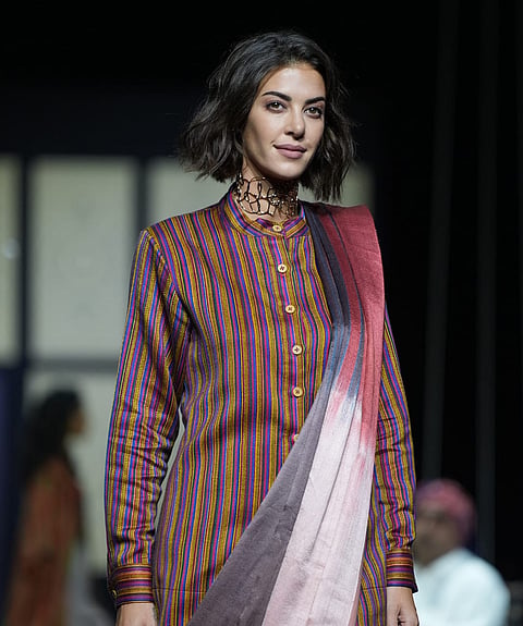 Model present creations by Artisan Designers Of Somaiya Kala Vidya: Zaid Khatri, Amruta Vankar, Mubbasirah Khatri, Muskan Khatri, Shakil Ahmed during the Lakmē Fashion Week in Mumbai. 