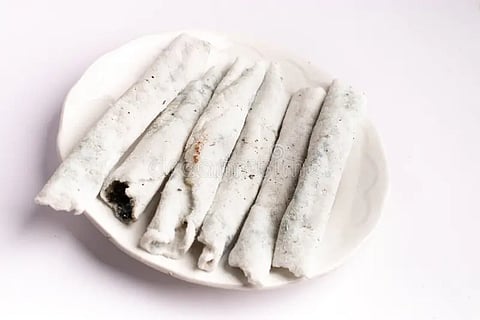 Til Pitha, a sweet delicacy