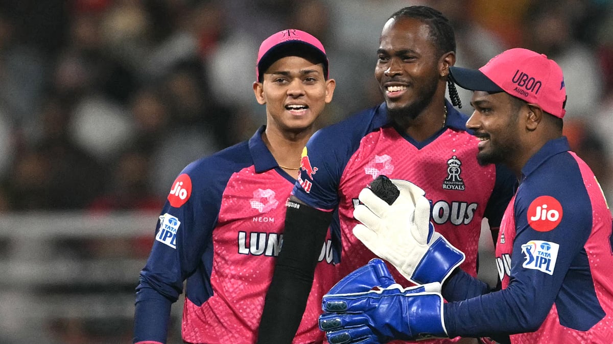 Jofra Archer celebrates with his Royals team-mates against Punjab Kings