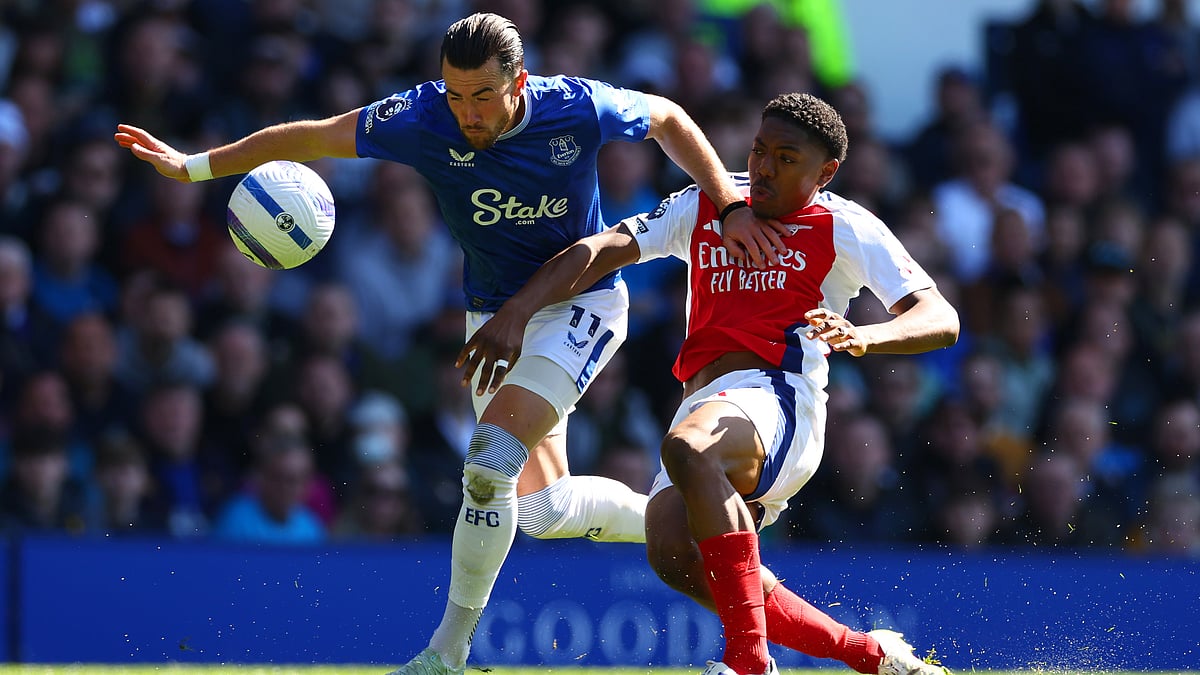 Myles Lewis-Skelly fouls Jack Harrison for Everton's penalty - null